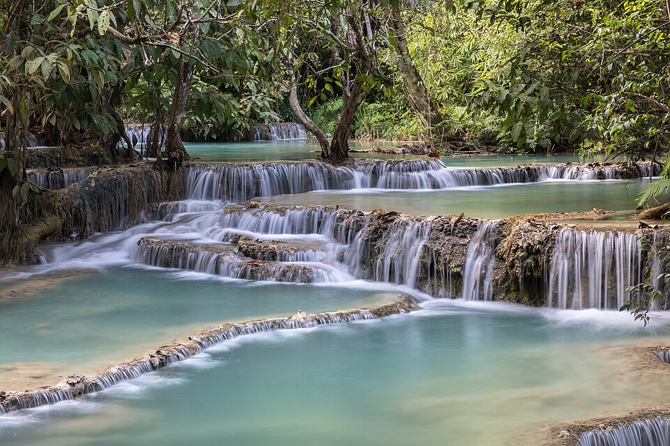 kuang si falls and its emerald water pools in luang prabang province laos