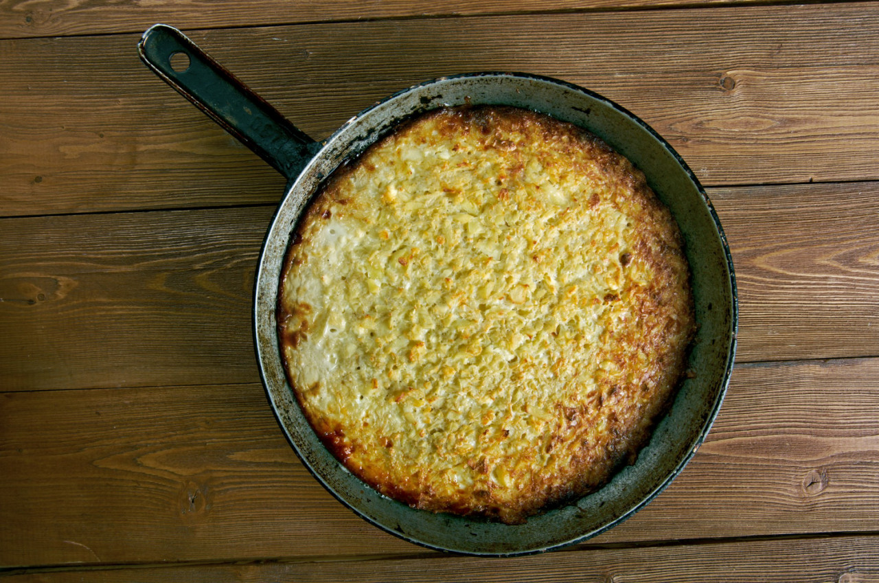 kugelis baked potato pudding main ingredients are potatoes bacon milk onions eggs lithuanian cuisine