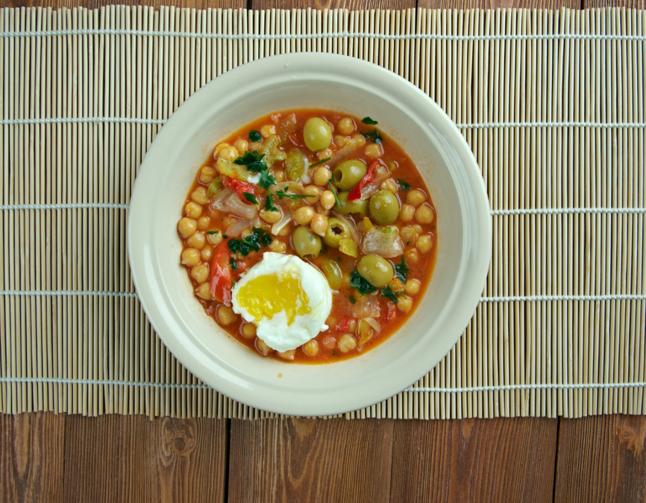 lablabi tunisian dish based chick peas raw soft cooked egg mix along with olive oil harissa sometimes olives garlic vinegar