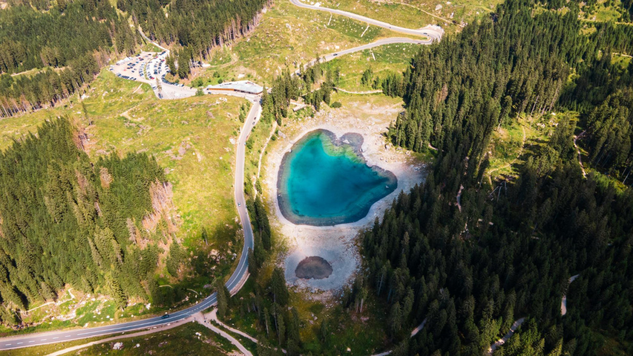 lake carezza dolomite alps italy