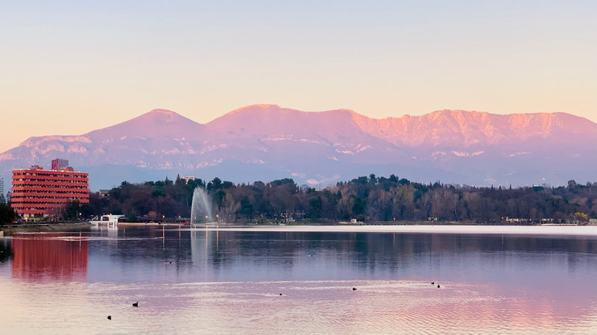 lake with forest and hills behind