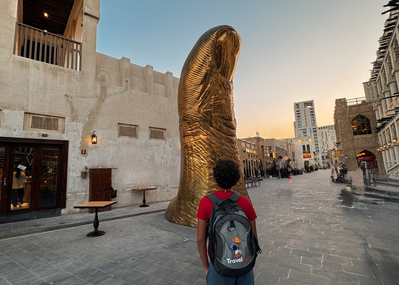 le pouce the golden thumb statue waqif