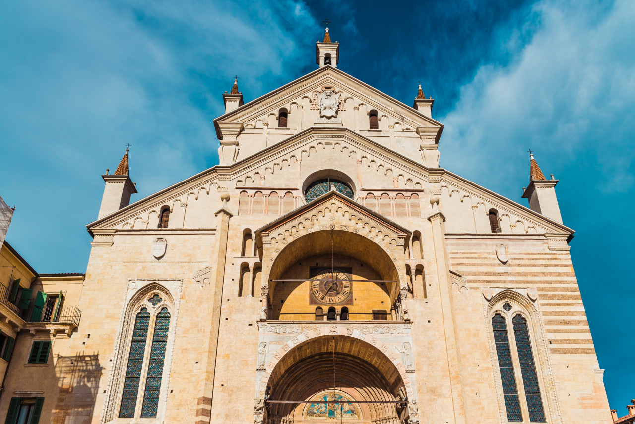 main facade verona cathedral illuminated by sun