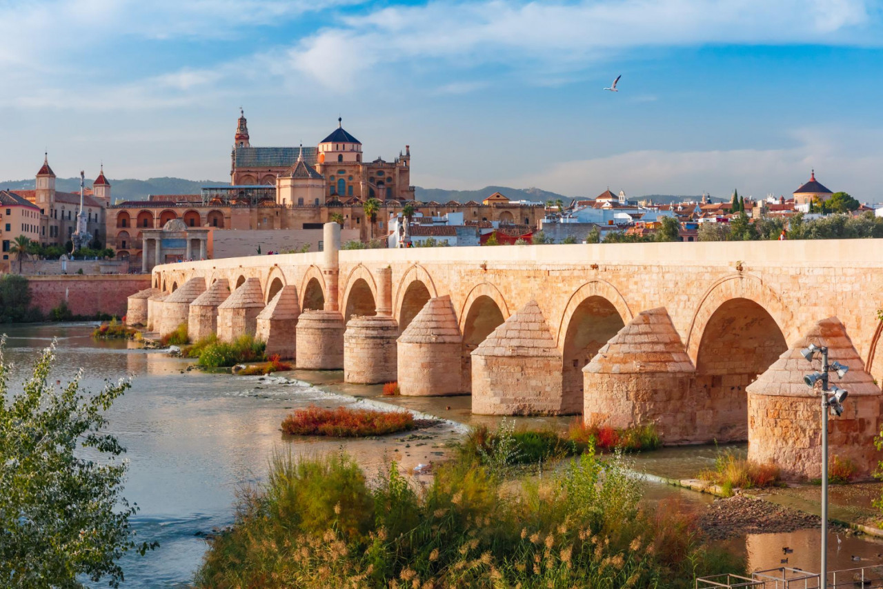 mezquita roman bridge cordoba spain