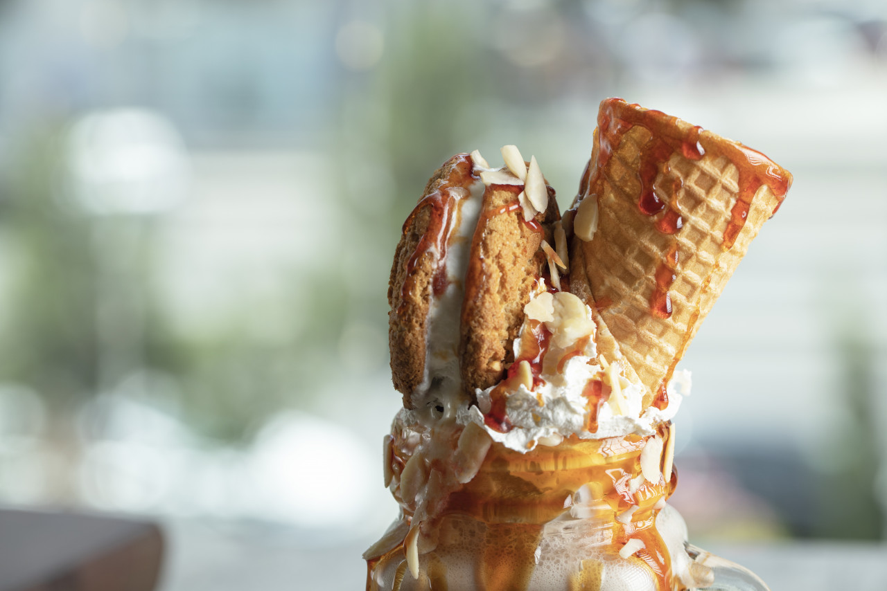 milky summer cocktail with waffle mapple syrup