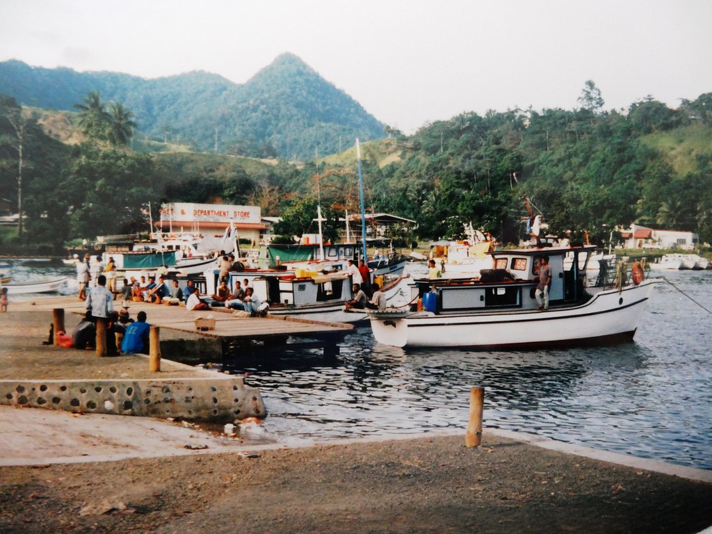 milne bay new guinea now alotau note the department store beyond the fishing boats