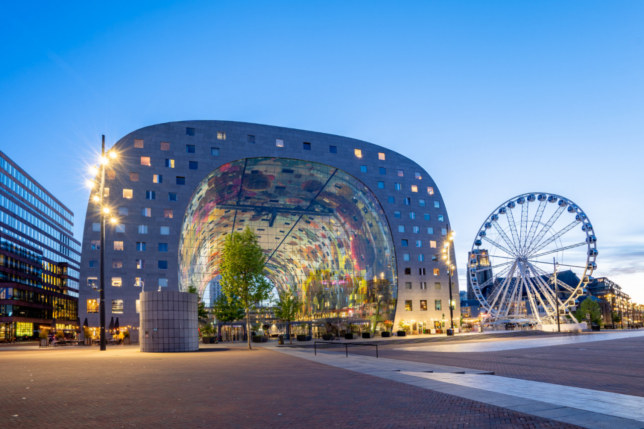 night view rotterdam city with markthal netherlands