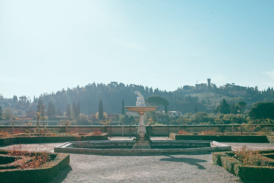 old stone fountain with sculpture