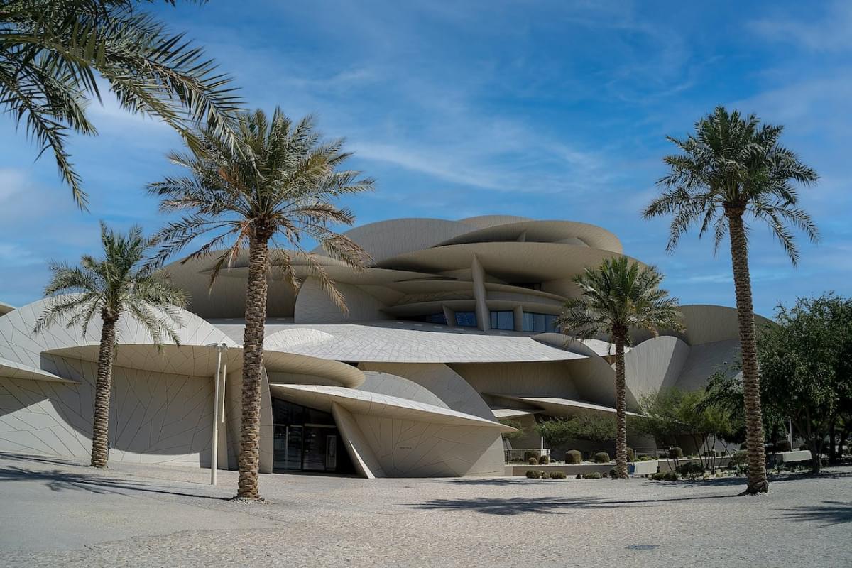 palm trees outside national museum of qatar