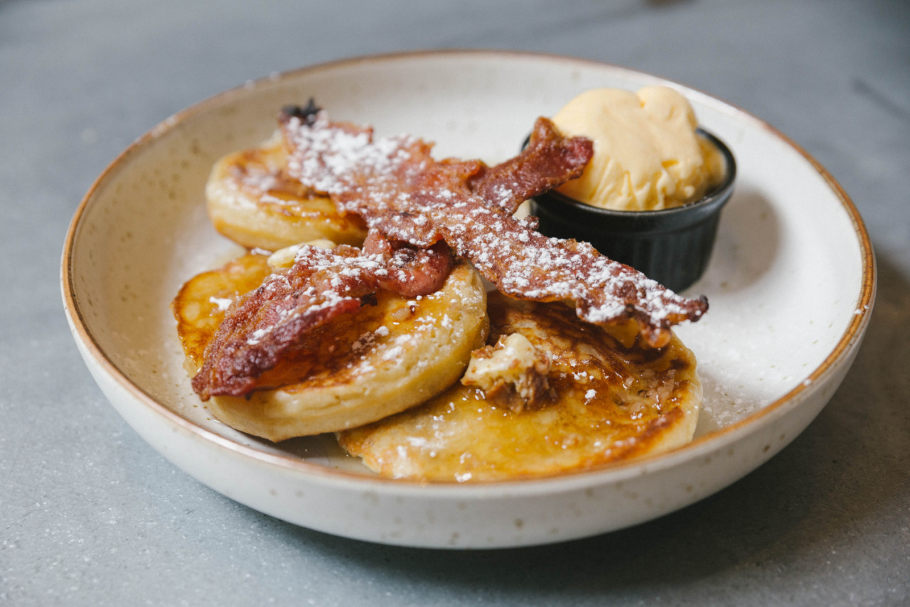 pancakes with butter maple syrup with crispy bacon vanilla ice cream