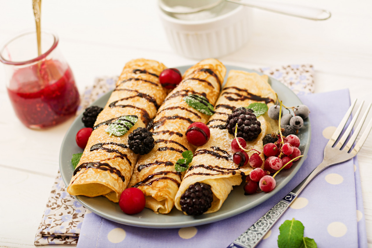 pancakes with chocolate jam and berries tasty breakfast