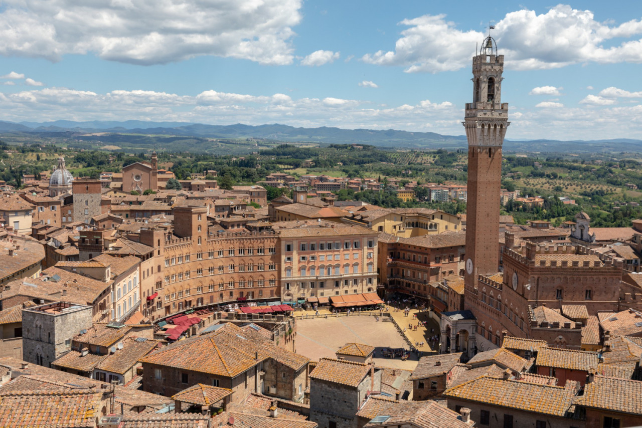panoramic view siena city with piazza del campo torre del mangia is tower city from siena cathedral duomo di siena summer sunny day dramatic blue sky