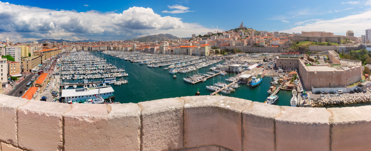 panoramic view sunny old port basilica notre dame de la garde background hill marseille france