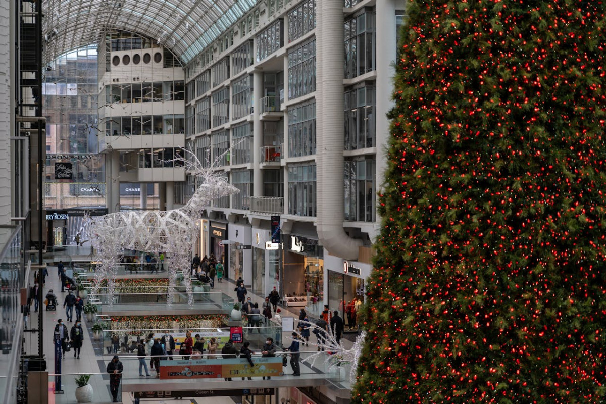 people busy walking in the shopping mall