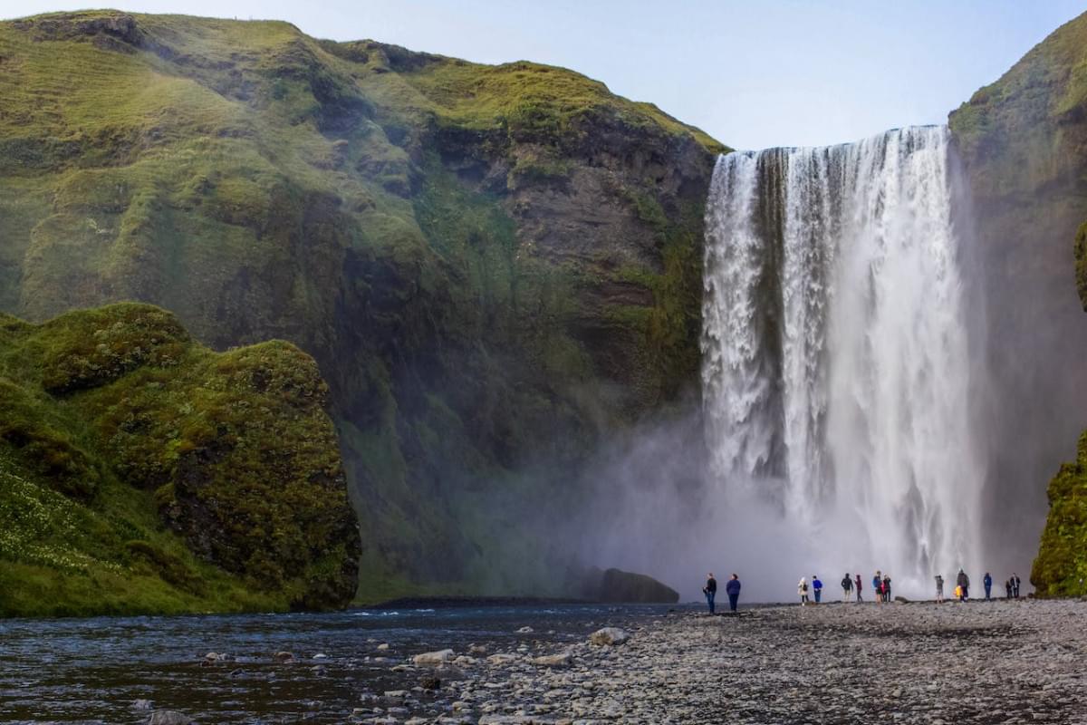 people looking at a view of waterfalls