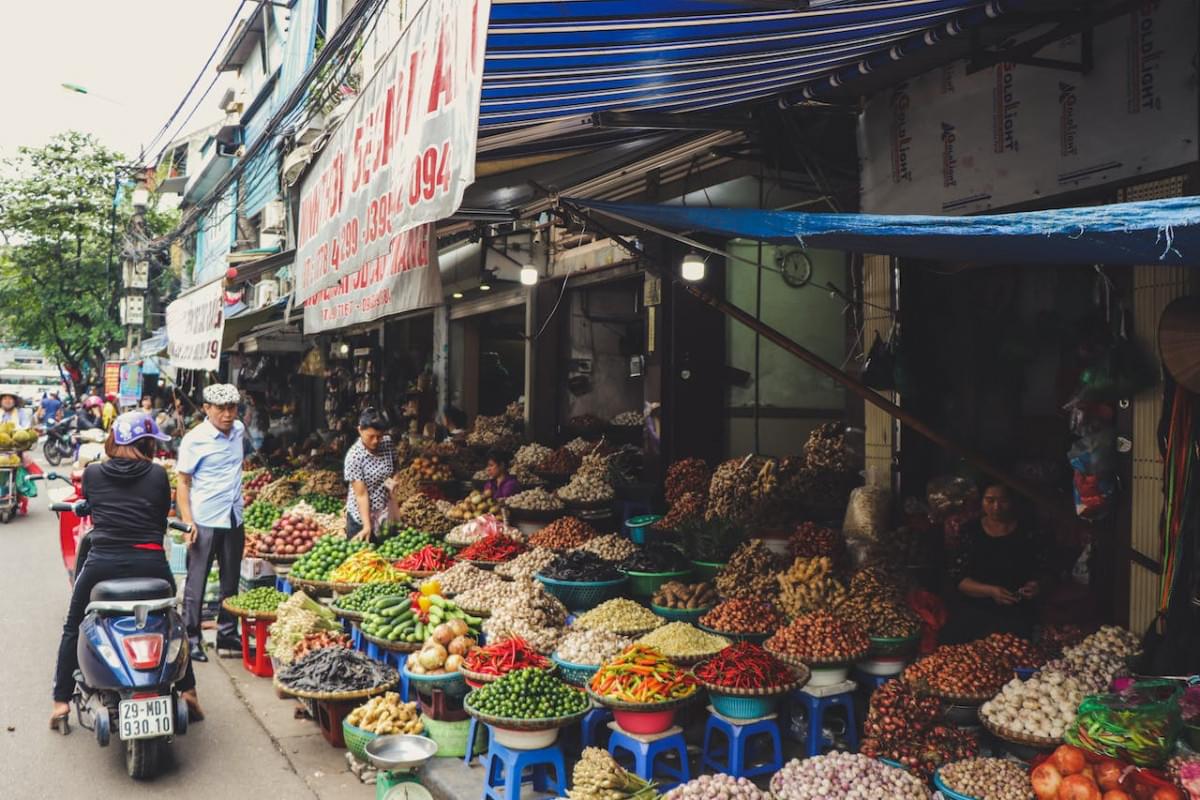 person in scooter in front of vegetables 1