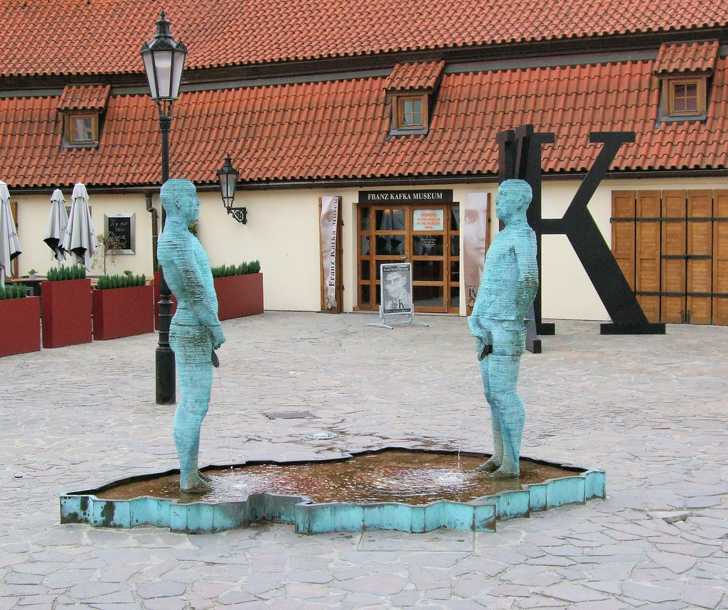 pissing men fountain kafka museum prague