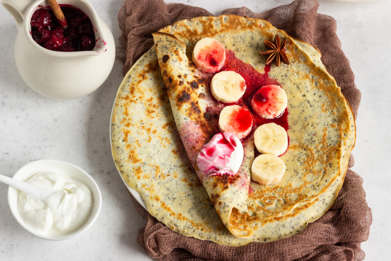 poppy seed pancakes with yogurt banana cherry sauce with spices