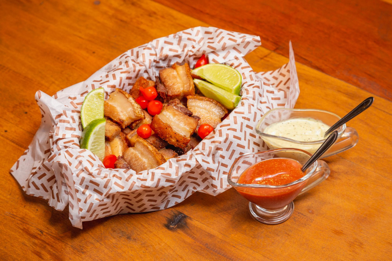 pork crackling bacon typical brazilian snack served with mayonnaise chili sauce
