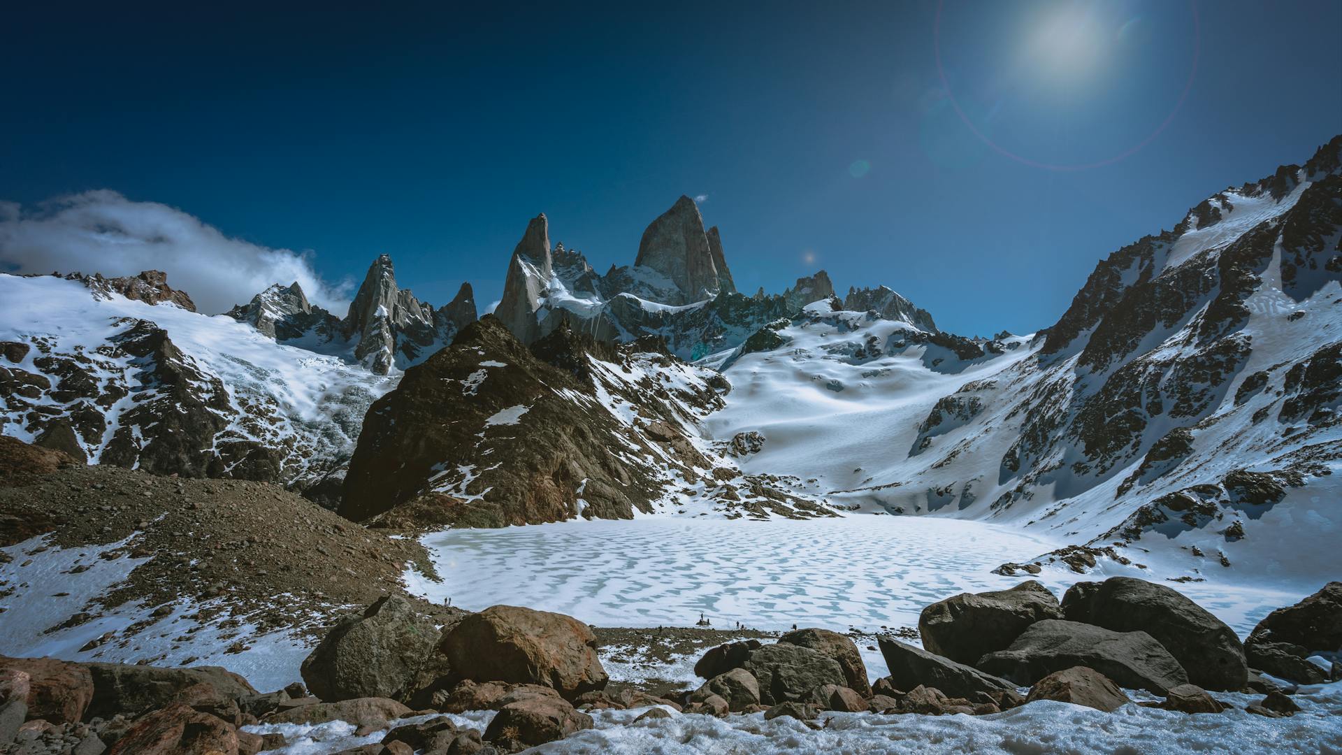 snow covered mountain under blue sky