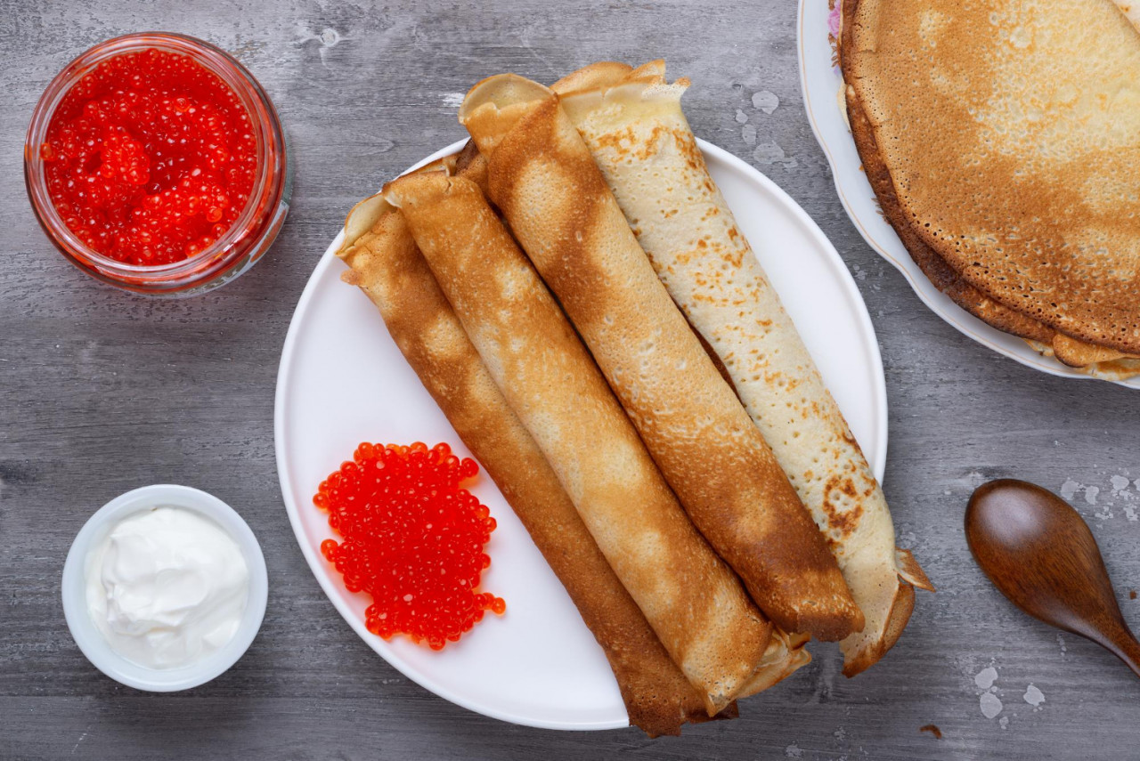 stack russian thin pancakes blini with red caviar fresh sour cream