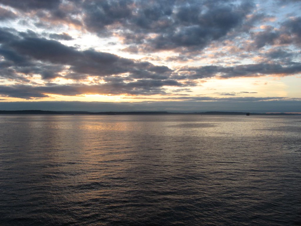 sunset over the puget sound seattle bremerton ferry washington