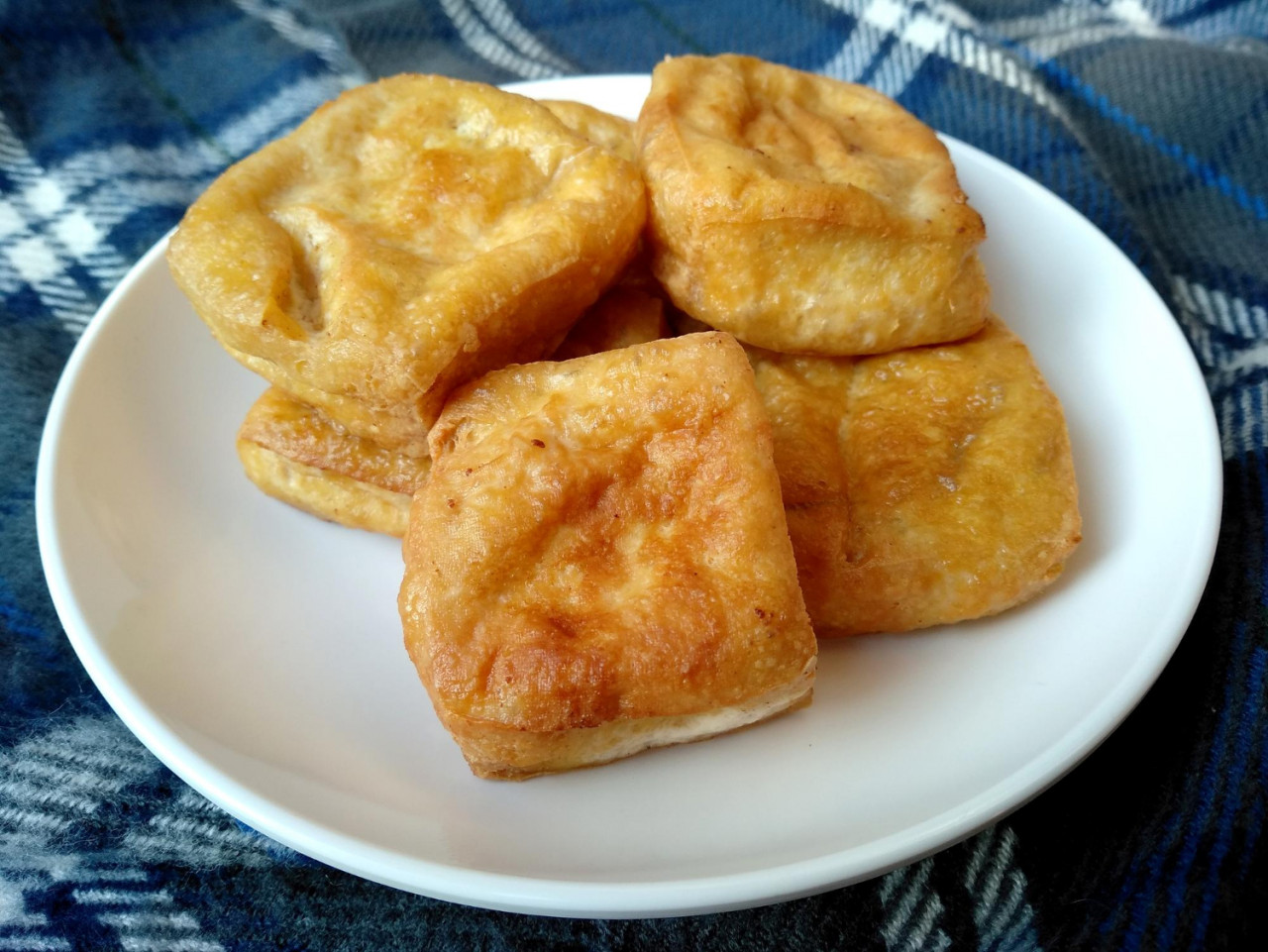 tahu goreng or fried tofu on a plate indonesian culinary food