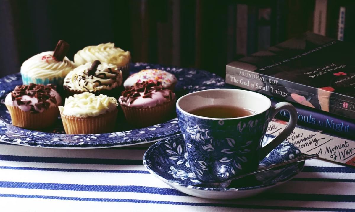 tea beside cupcakes