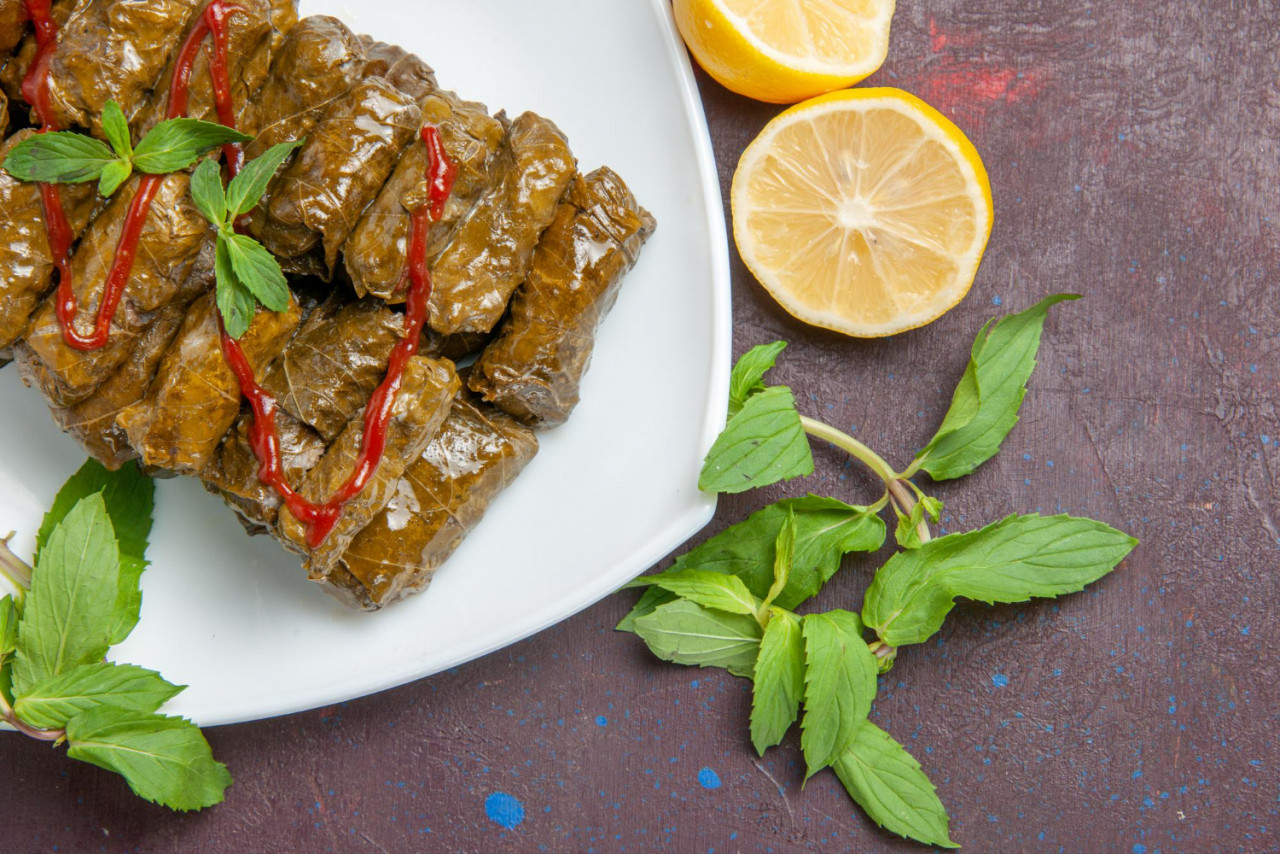 top view delicious leaf dolma ground meat dish inside plate dark background dish leaf dinner food meat