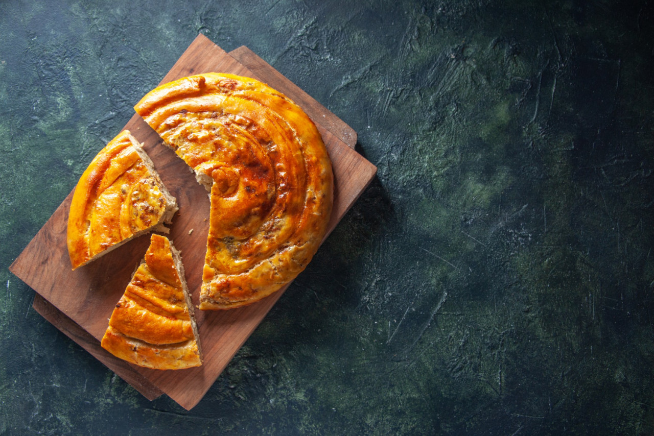 top view delicious meat pie wooden board