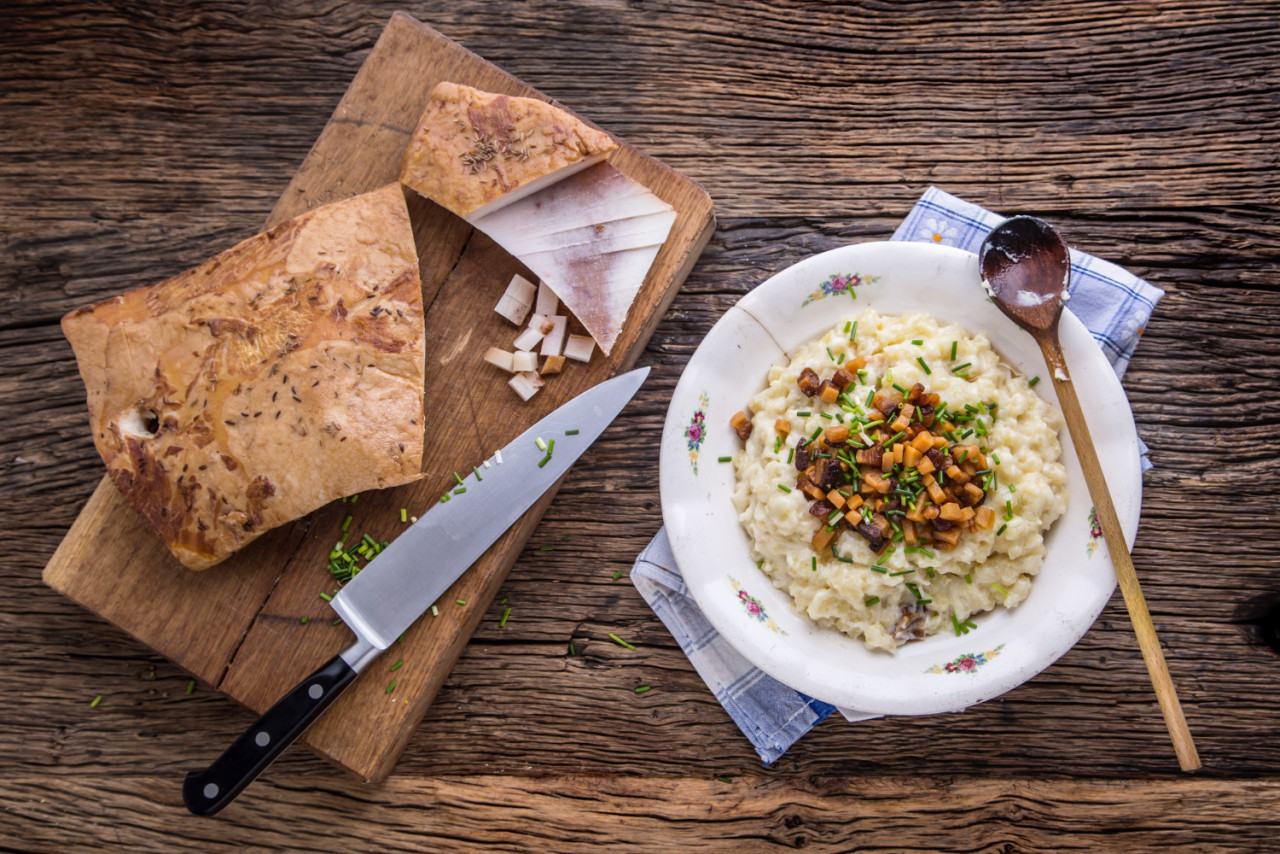 traditional slovakian meal dumplings halusky on wooden table