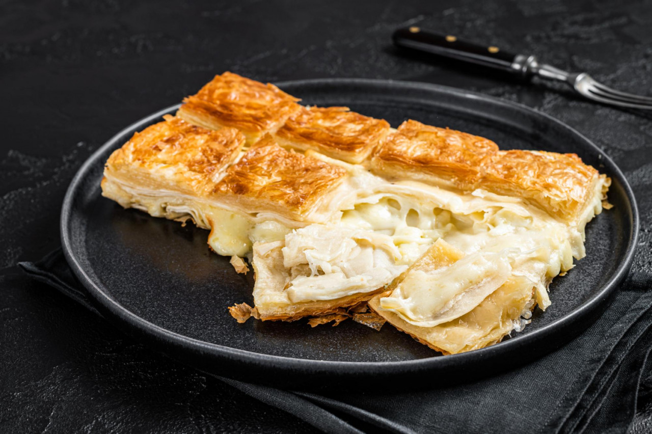 turkish su boregi pie tabla borek or burek in plate black background top view