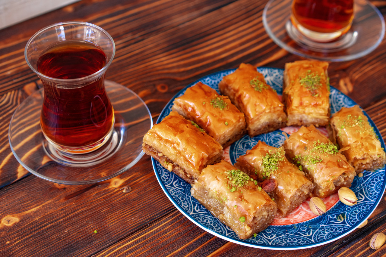 turkish sweet baklava with turkish tea wooden background