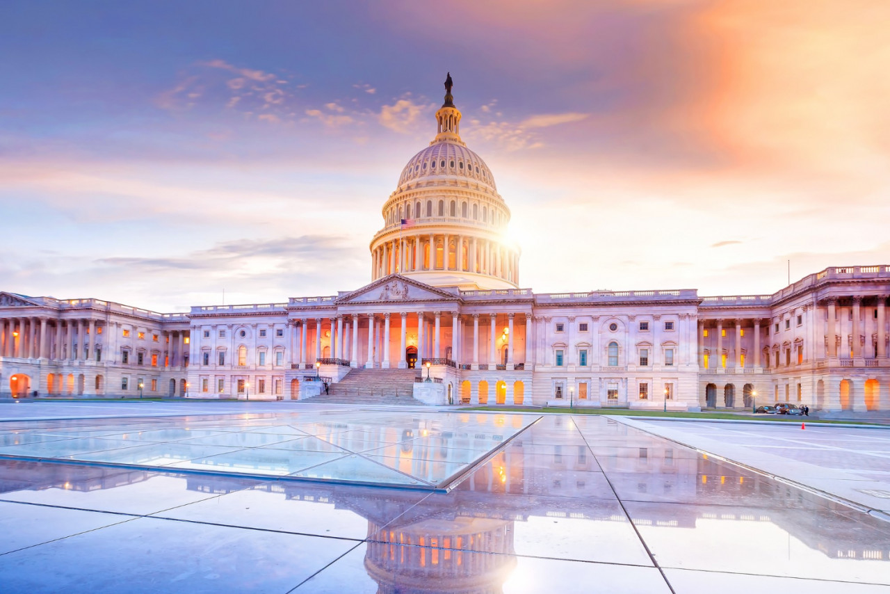 united states capitol building with dome lit up night 1