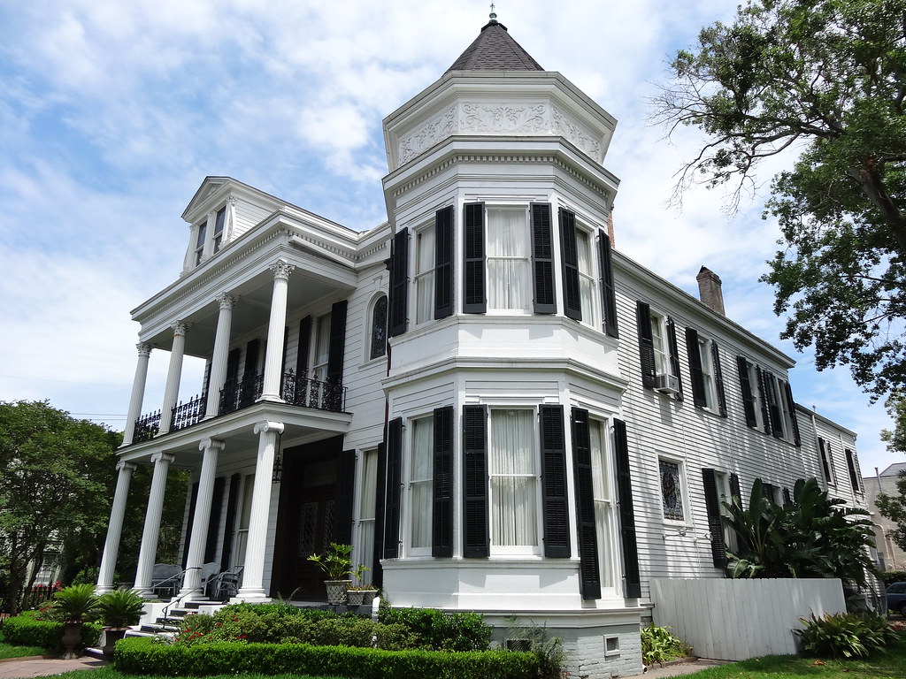 victorian style mansion in the garden district