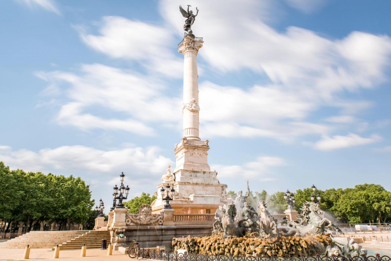 view quinconces square with girondins fountain bordeaux city france long exposure image technic with motion blurred clouds