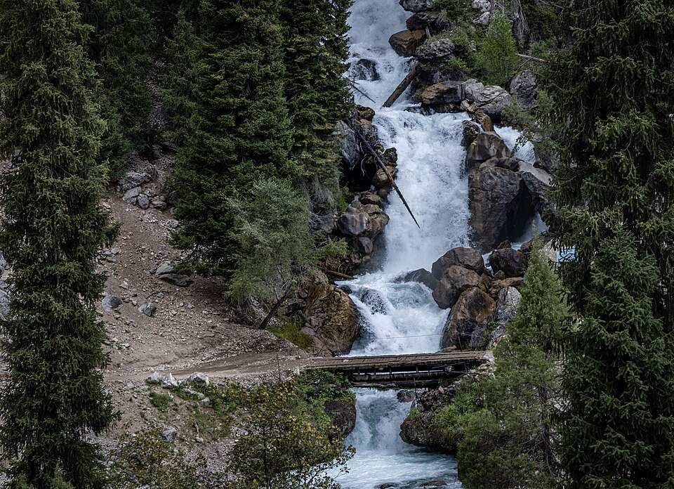 waterfall at the kara kamysh lake in sary chelek reserve
