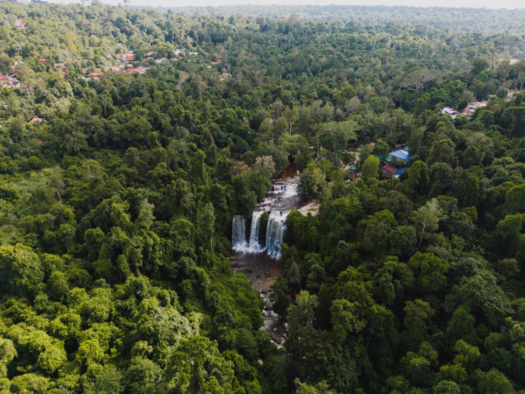 waterfalls near village in forest